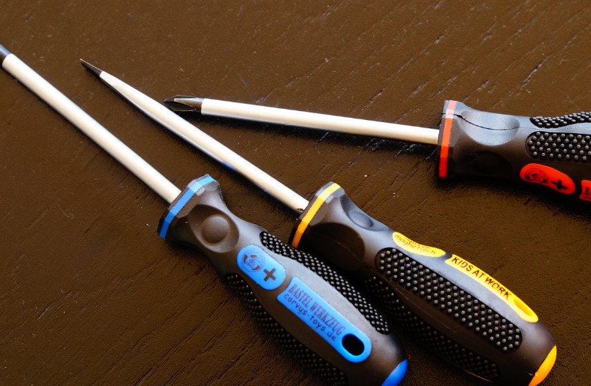 Flat-head and Phillips screwdrivers for woodworking assembly