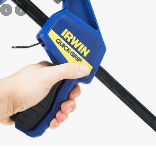 Wood clamps holding glued pieces in place